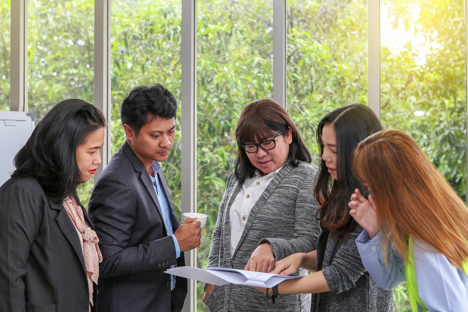 Team reviewing documents for incorporated associations, discussing member disputes.