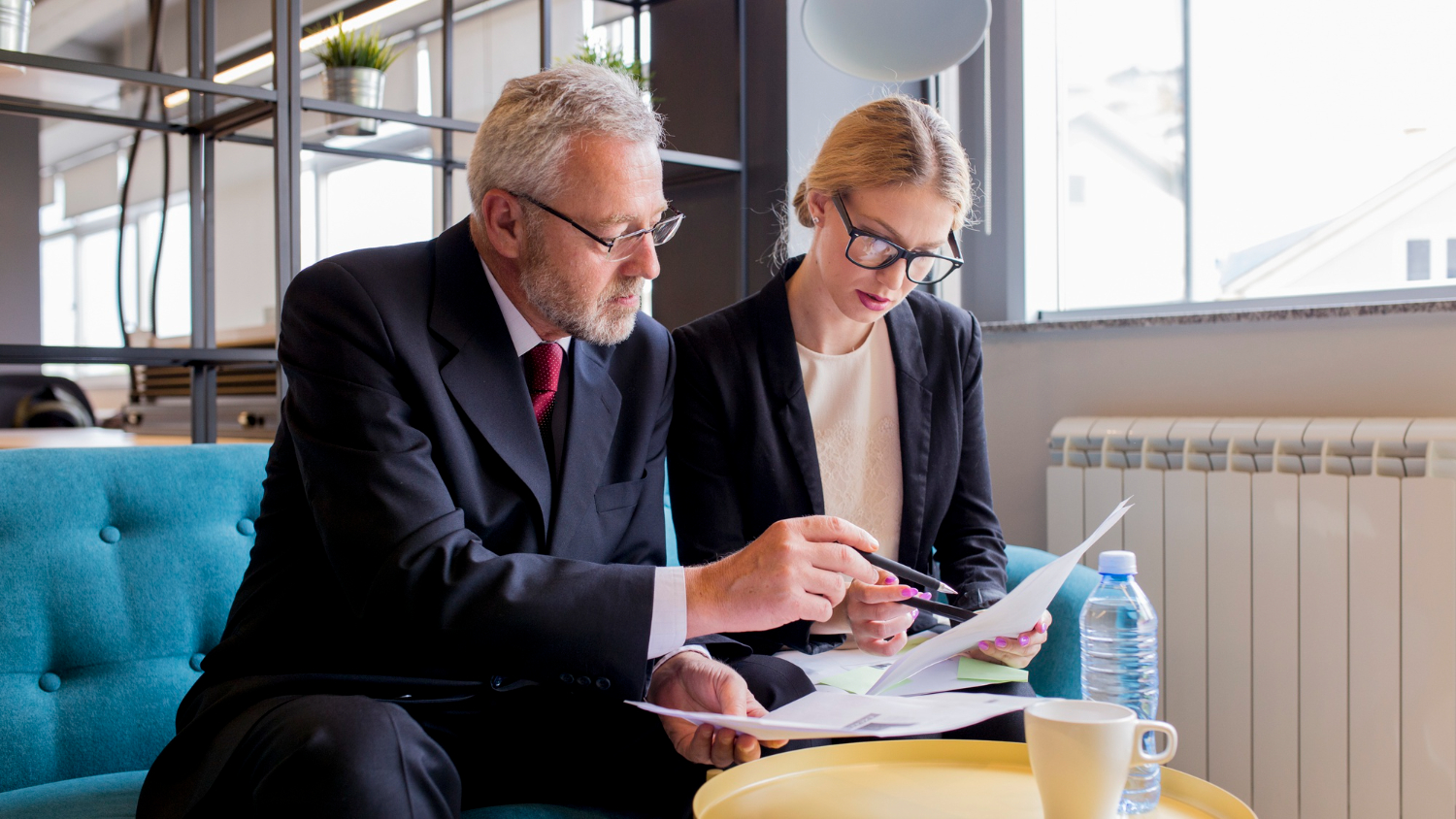 Business professionals discussing probate costs and solicitor fees in NSW