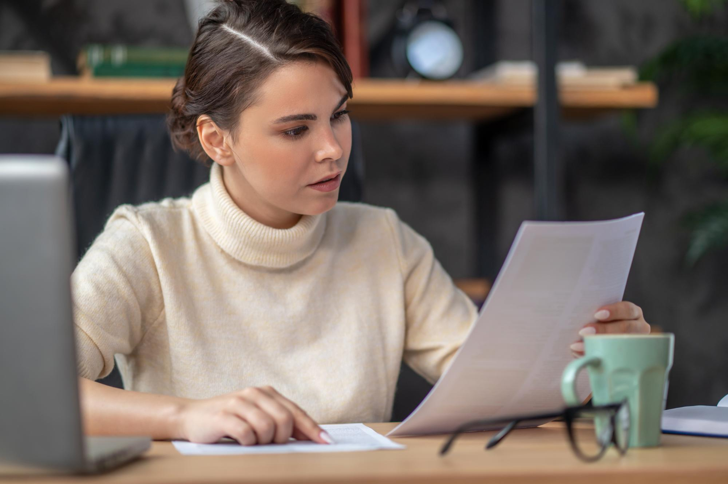 Woman reviewing documents for Letters of Administration in NSW